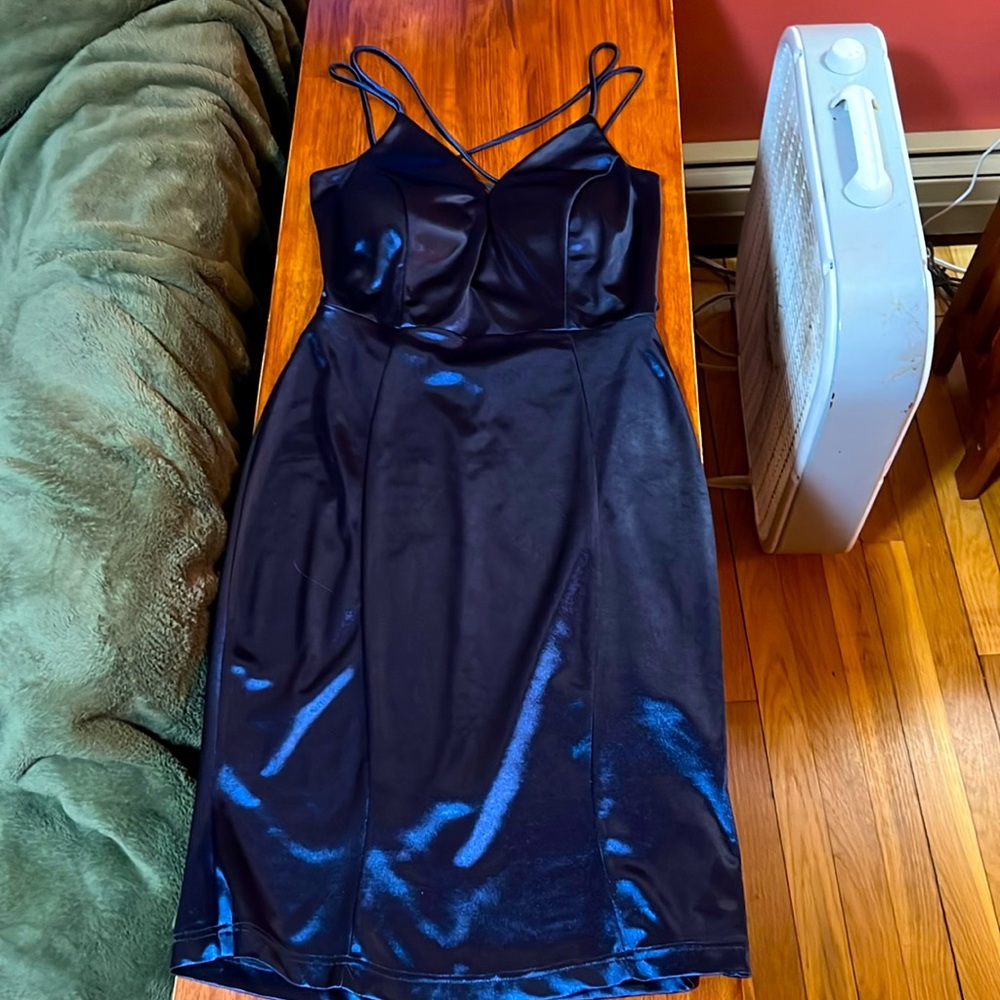 Navy blue tight fitting mini dress.